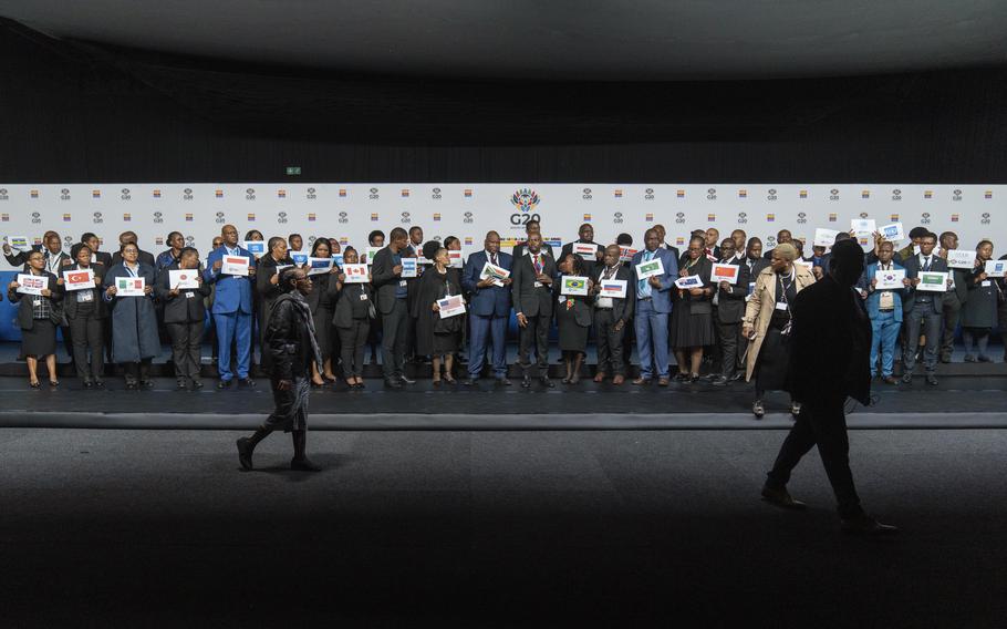 Placeholders prepare for a family photo of the G20 foreign ministers meeting that was later cancelled in Johannesburg, South Africa, Thursday, Feb. 20, 2025.