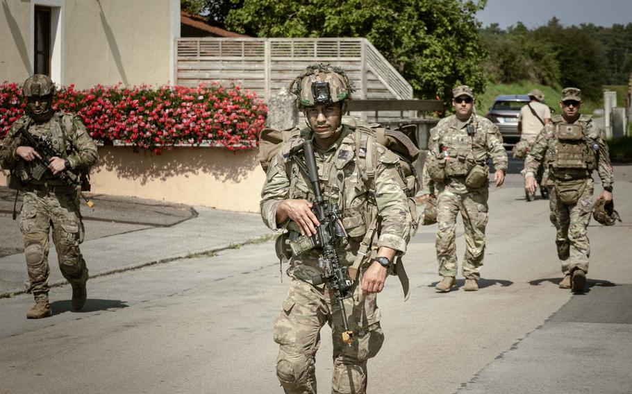 Soldiers with the 173rd Airborne Brigade march through a German town after a parachute landing outside of the Joint Multinational Readiness Center Hohenfels Training Area on Sept. 4, 2024. Saber Junction 24 brought together over 4,000 troops from the U.S. and 10 partner nations.