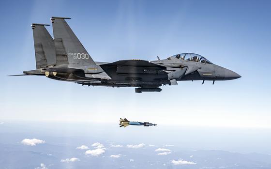 A South Korean air force F-15K Slam Eagle drops a laser-guided bomb while training over Gangwon Province, South Korea, Oct. 30, 2024.