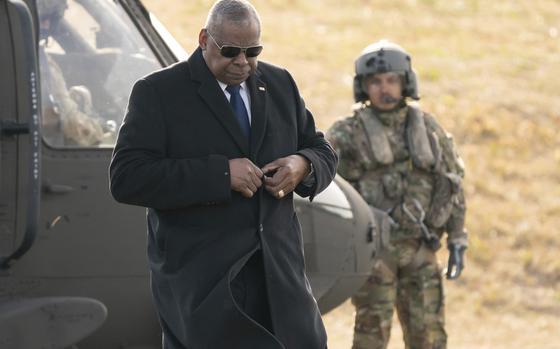 U.S. Secretary of Defense Lloyd Austin arrives at Camp Asaka, a Japan Ground Self-Defense Force base, on the outskirts of Tokyo, Wednesday, Dec. 11, 2024.(Tomohiro Ohsumi/Pool Photo via AP)