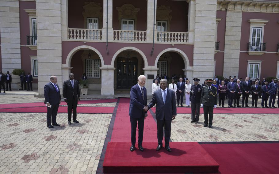 President Joe Biden shakes hand with Angola’s President Joao Lourenco