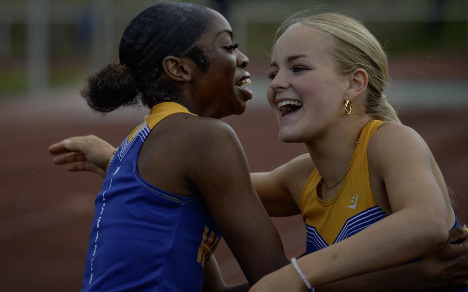 Makiah Parker, left, rejoices with her Wiesbaden teammate Lana Winters after winning the girls 200-meter dash finals at the 2024 DODEA European Championships at Kaiserslautern High School in Kaiserslautern, Germany, on May 24, 2024. Parker ran 24.51 seconds, while Winters finished third with 25.60 seconds.