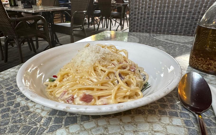 The pasta carbonara at Osteria La Toscana restaurant in Weiden, Germany, June 16, 2023. The menu has many classic Italian dishes, pastas and pizza.