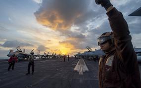 250112-N-FS097-1068 SOUTH CHINA SEA (Jan. 12, 2025) - Sailors prepare for flight operations on the flight deck of the Nimitz-class aircraft carrier USS Carl Vinson (CVN 70), Jan. 12, 2025. Vinson, the flagship of Carrier Strike Group ONE, is underway conducting routine operations in the U.S. 7th Fleet area of operations. (U.S. Navy photo by Mass Communication Specialist 3rd Class Nate Jordan)