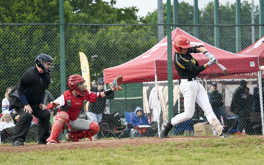Stuttgart’s David Scudder hits a single to bring in the game-winning runs in a back-and-forth 6-5 victory over Kaiserslautern during the knockout rounds of the 2024 DODEA European baseball championships on May 23, 2024, at Southside Fitness Center on Ramstein Air Base, Germany.
