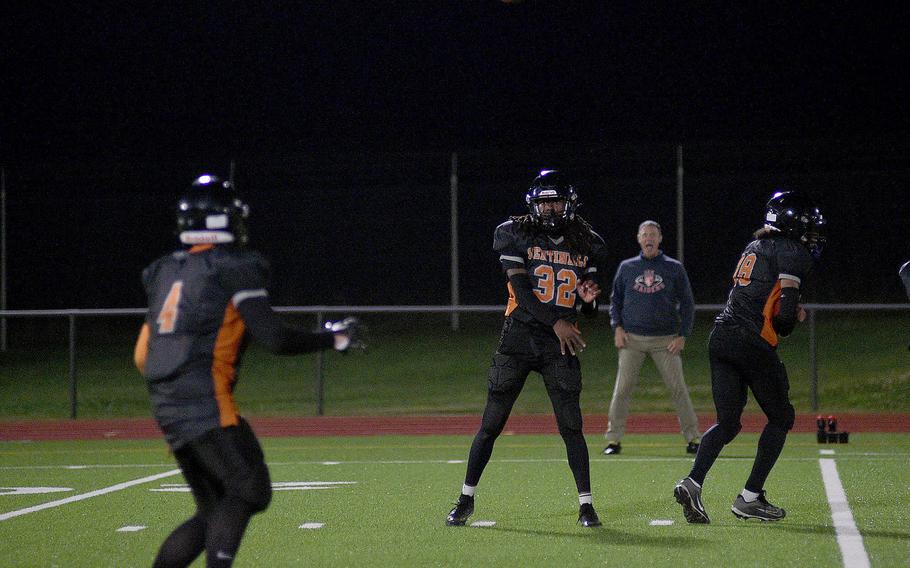 Spangdahlem quarterback Messiah Smith throws a pass to receiver Logan Simmers during a Sept. 21, 2024, game against International School of Brussels at Spangdahlem High School in Spangdahlem, Germany.