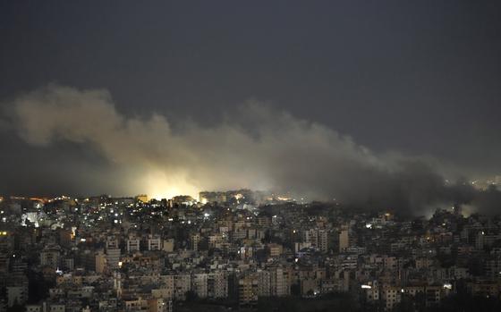 Smoke rises from an Israeli airstrike on Dahiyeh, in the southern suburb of Beirut, Lebanon, Sunday, Oct. 20, 2024. (AP Photo/Hussein Malla)