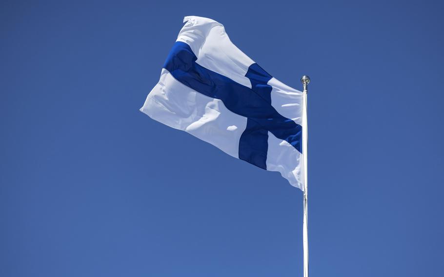 The national flag of Finland.