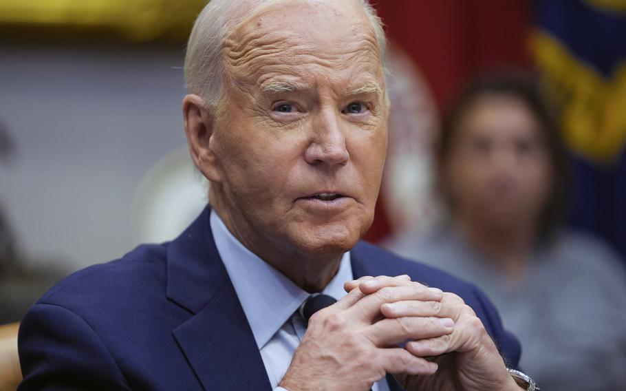 President Joe Biden clasps his hands while speaking about Hurricanes Helene and Milton.