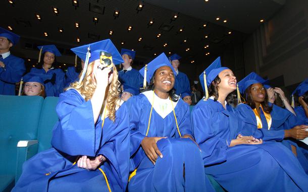 Yokota High School, Japan, June 8, 2005: Yokota High School senior class president Jamie Monahan, left, takes a picture of a friend receiving a diploma during the school's graduation ceremony  at Fussa City Civic Hall. 

Check out Stars and Stripes Pacific [https://ww2.stripes.com/epaper/special-publications/pacific-grad-tabs] and Europe [https://ww2.stripes.com/epaper/special-publications/europe-grad-tabs] 2024 Grad Tabs!

META TAGS: Class of 2024; graduation; DODEA; Grad Tabs