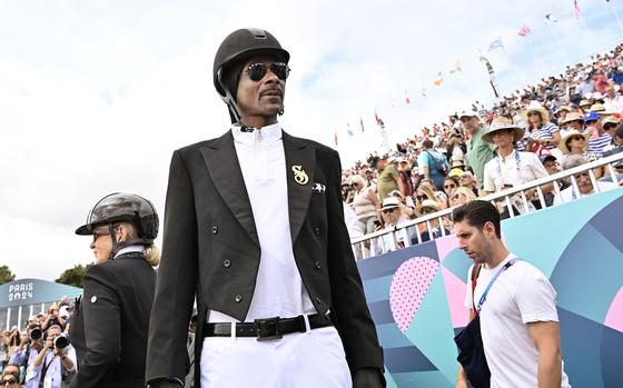 Snoop Dogg attends the equestrian’s team dressage final during the 2024 Paris Olympics at the Chateau de Versailles, in Versailles, France, on the western outskirts of Paris, on Aug. 3.