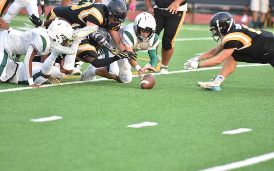 Vicenza and Naples players scramble for a loose ball Friday, Sept. 20, 2024,  in the Wildcats' 28-6 victory in Vicenza, Italy.

Kent Harris/Stars and Stripes