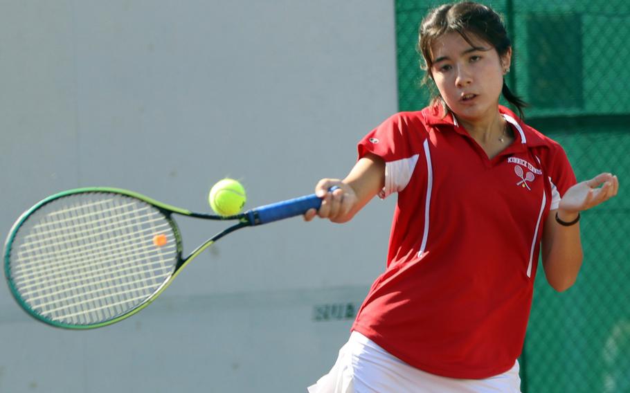 Catherin kerns hits a forehand.