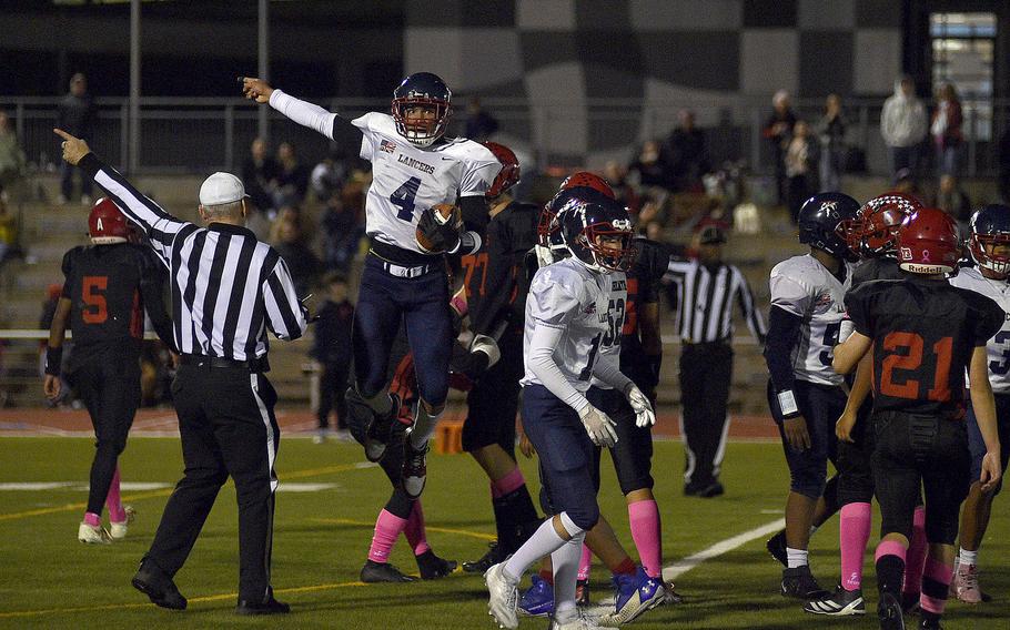 Jaden DuBois celebrates a fumble recovery.