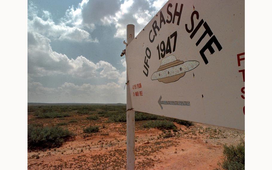 A sign directs travelers to the start of the “1947 UFO Crash Site Tours” in Roswell, N.M., as seen on June 10, 1997. 