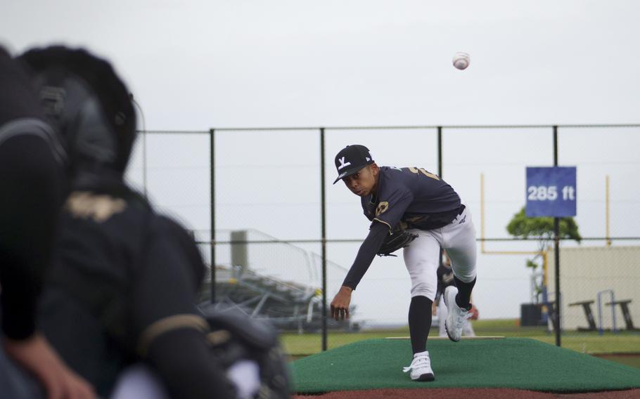 Luka Koja, a left-hander from Kubasaki High School at Camp Foster, Okinawa, pitches against Japanese players during a clinic at Yokosuka Naval Base south of Tokyo, May 12, 2024.