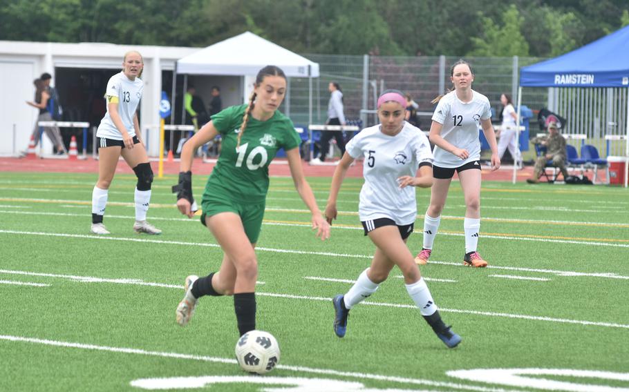 Vicenza's Dariadna Lopez-Nieves tries to keep pace with Naples' Emerson Shorey during the DODEA European Division II girls soccer championshp game Thursday, May 23, 2024, at Ramstein High School in Germany.