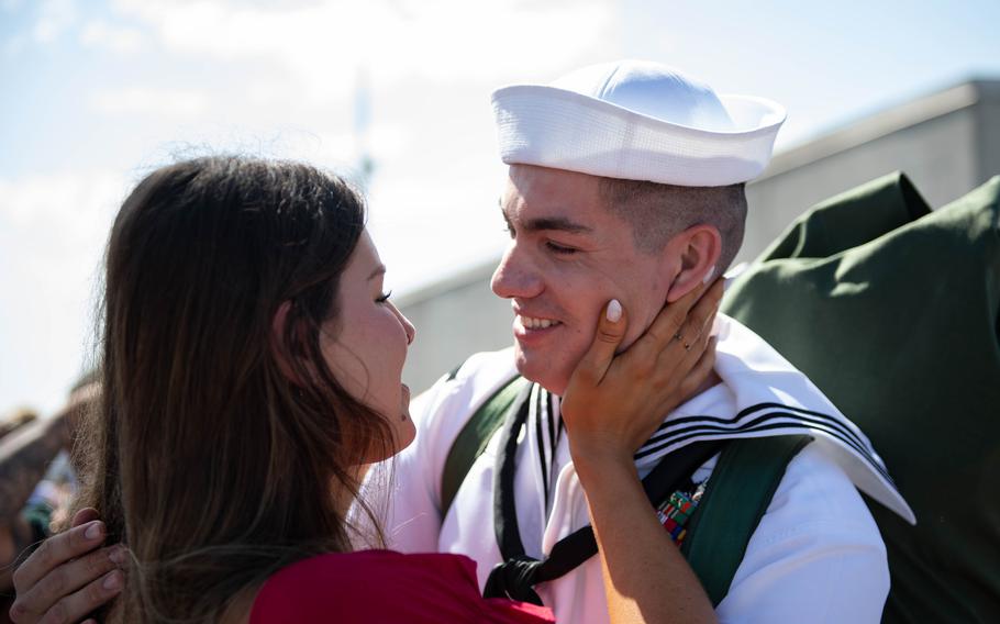 Hospital Corpsman 2nd Class Tyler Martinez, from Surprise, Ariz., embraces his girlfriend after returning home from deployment aboard the USS Carney on Sunday, May 19, 2024, at Naval Station Mayport, Fla. 