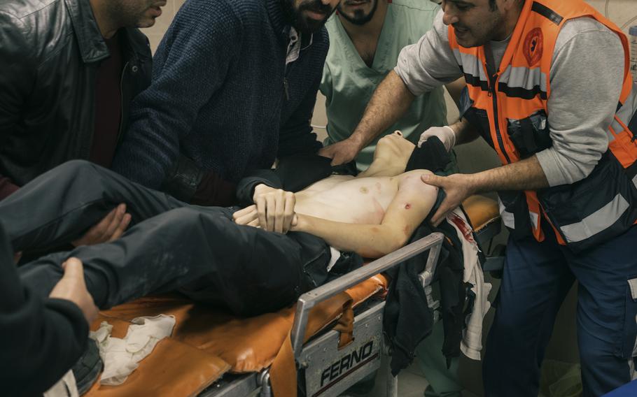 Bassem Abu el-Wafa, 15, arrives at Jenin’s public hospital Nov. 29, 2023, after Israeli soldiers shot him in the abdomen during a raid as he stood at an intersection in Jenin city with other boys, including Ghoul, CCTV videos synced and geolocated by The Post show. The object Wafa appeared to try to light as he moved toward the middle of the road was roughly the size of his palm, the videos showed. 