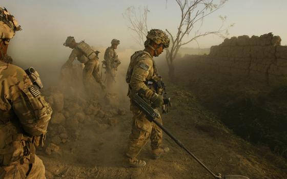 HED: Listening for the beep, 2011

Kandahar Province, Afghanistan, Aug. 27, 2011: Sgt. Ramone Villablanca of Company C, 1st Battalion, 32 Infantry Regiment, 3rd Brigade Combat Team, 10th Mountain Division uses a "minehound" to check for improvised explosive devices after soldiers blew an anti-personnel obstacle breaching system during Operation Steel Lion III at Strong Point Alizi in Kandahar Province, Afghanistan. 

Read the story here.https://www.stripes.com/migration/clear-goal-risky-approach-for-operation-steel-lion-3-1.155875

META TAGS: Operation Enduring Freedom; Operation Steel Lion; U.S. Army; IED; 10th Mountain Division; 