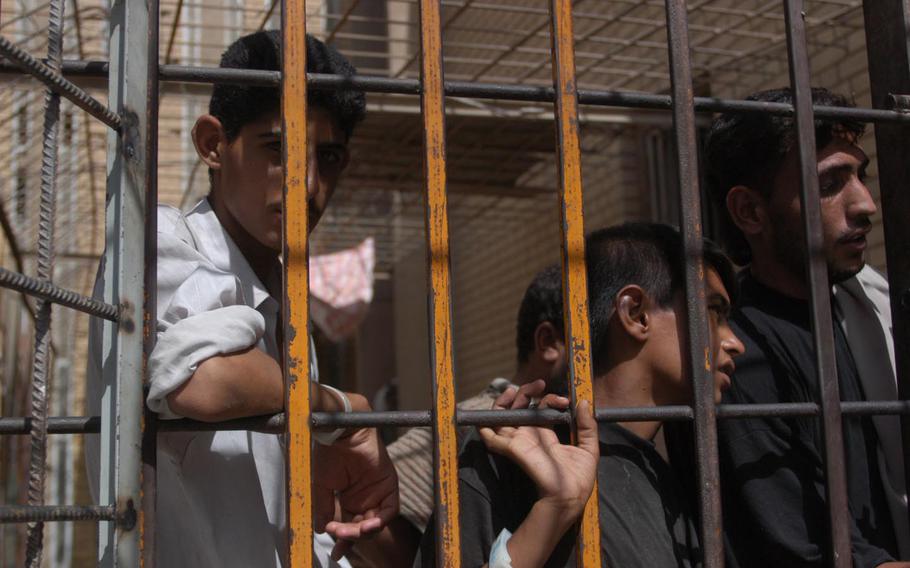 Prisoners wait in Karbala jail