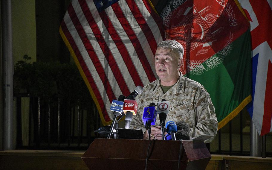Marine Gen. Frank McKenzie, then-commander of U.S. Central Command and head of Afghan troops in Afghanistan, speaks to reporters at the former Resolute Support headquarters in Kabul on July 25, 2021. Now retired, McKenzie published his memoir, “The Melting Point: High Command and War in the 21st Century.” 