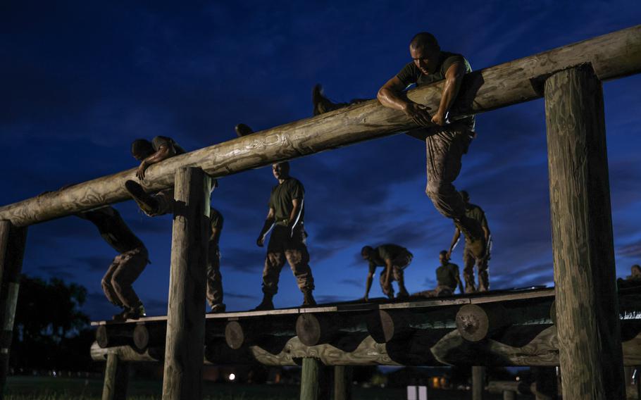 Recruits with Kilo Company, 3rd Recruit Training Battalion, conduct the Obstacle Course on Marine Corps Recruit Depot Parris Island, S.C., July 23, 2024. 