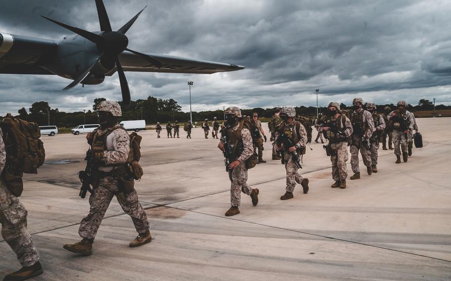 U.S. Marines and Navy sailors board a C-130 in Spain to head to an exercise in Mali, April 2021.