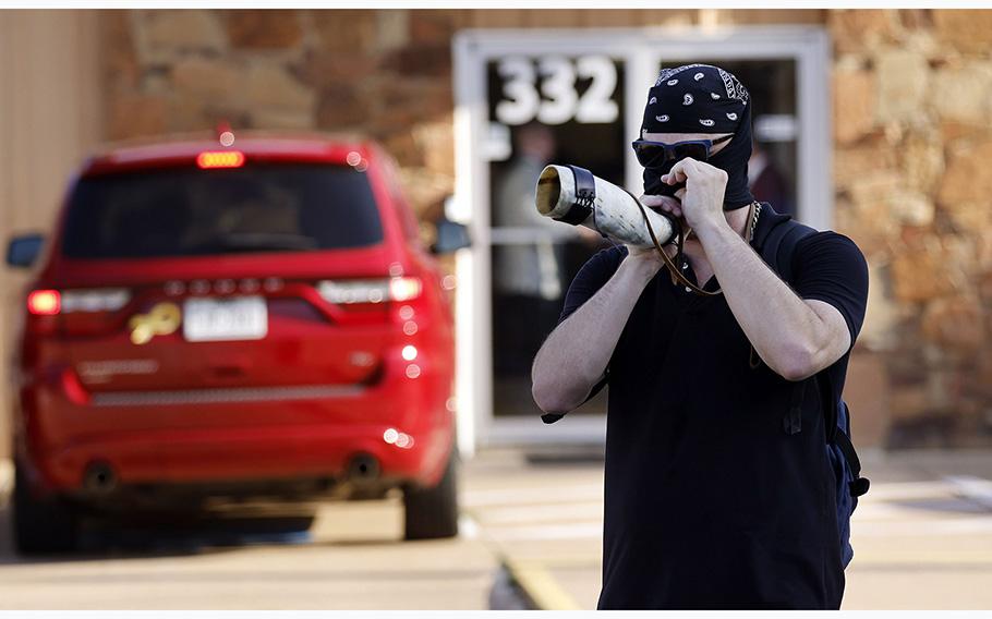 A protestor with No Hate In Texas uses a real bullhorn to annoy New Independent Fundamentalist Baptist followers who met at their new location in Cedar Hill, Texas, July 12, 2023. 