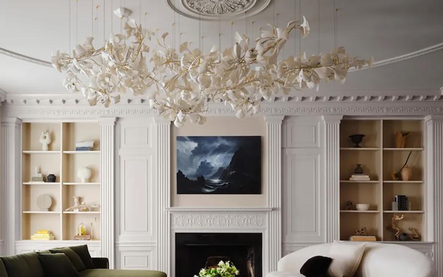 Living room of the Georgetown Manse with its original parquet flooring and custom-made fireplace.