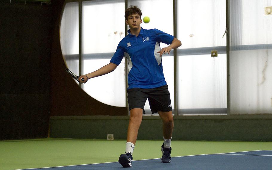 Riccardo Averni hits the ball.