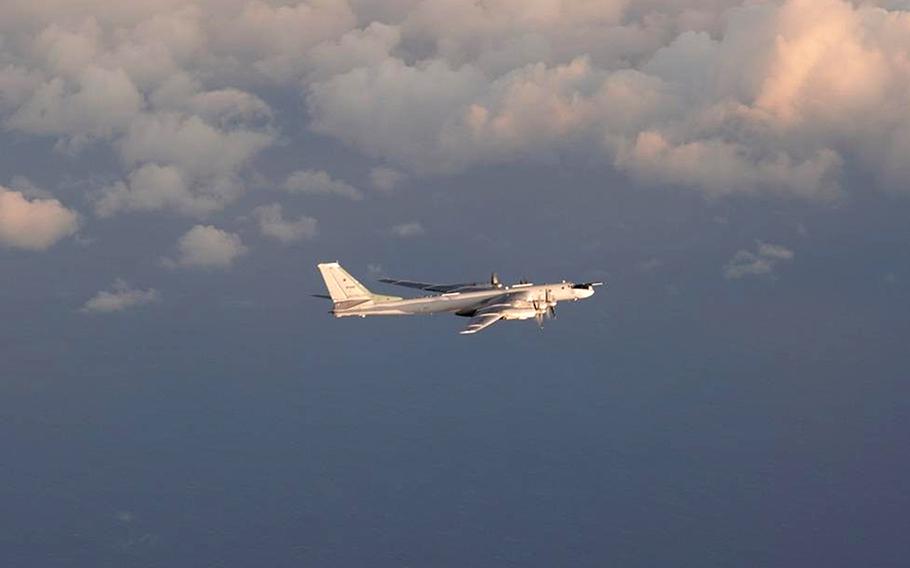 A Russian Tu-95 strategic bomber flies north of Norway.