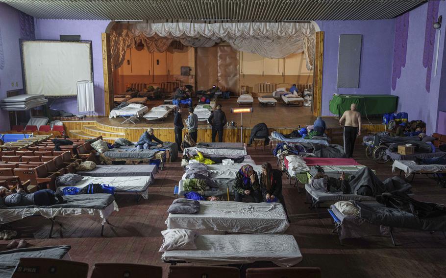 A room with beds for displaced people.