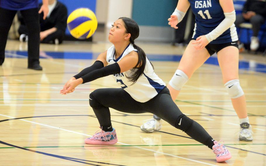 Annicia Cruz bumps the ball.