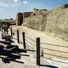 Cannons were used under Portuguese control of the Bahrain Fort in the 16th century. The Portuguese occupied Bahrain in 1521 and used it as part of their strategic defense.