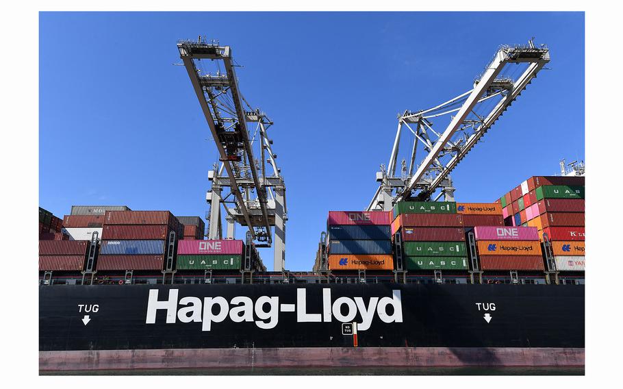 The Hapag Lloyd containers ship is seen in Rotterdam's Harbour, in Rotterdam on Aug. 1, 2022. 