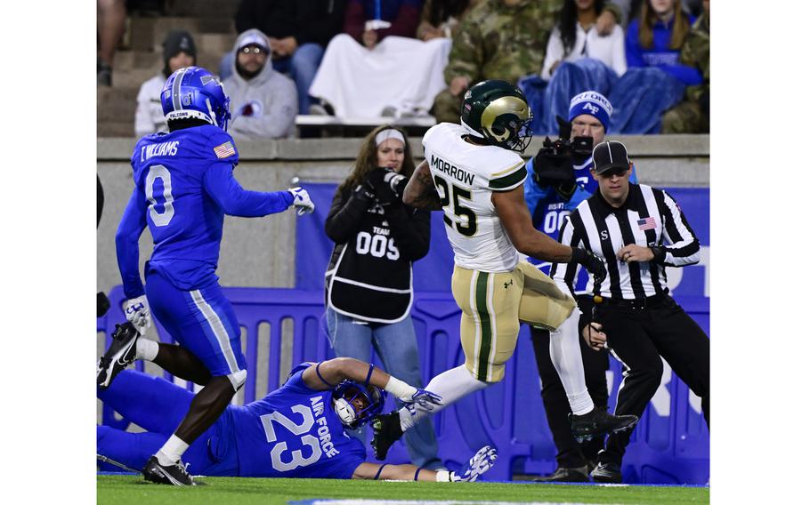 Air Force defensive back Lincoln Tuioti-Mariner forces Colorado State running back Avery Morrow out of bounds.