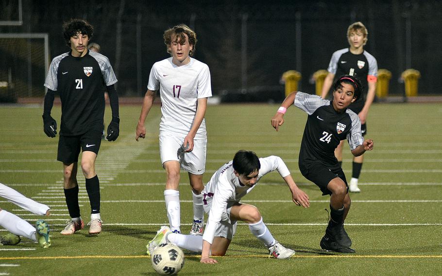 Cristian McGinnis gets the ball around james Idems.