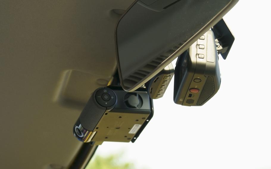 A child presence detection device is installed on a Global Step Academy bus picking up students at Yokota Air Base, Japan, July 20, 2023. 