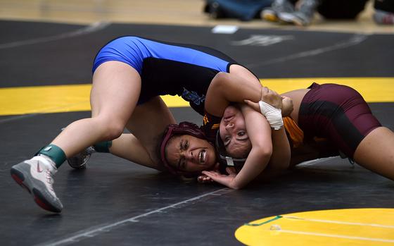 Vilseck's Jesscia Gomez and Rota's Athena Quiroz grapple during a 120-pound semifinal at the 2025 DODEA European wrestling championships on Feb. 7, 2025, at the Wiesbaden Sports and Fitnes Center in Wiesbaden, Germany.