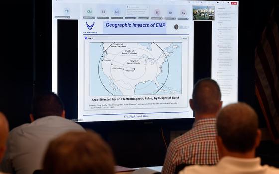 Participants watch a powerpoint presentation during an electromagnetic pulse attack exercise held at the Chicopee Public Safety building.  (Don Treeger / The Republican)  9/10/2024