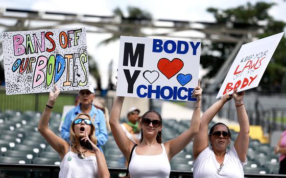 People attend the Our Bodies Our Lives: A Rally for Reproductive Freedom at the Bayfront Amphitheater on Sept. 14, 2024, in Miami, Florida. The rally was held to advocate for the passage of Amendment 4, which will be on the state of Florida's November ballot, giving women a constitutional right to abortion in the state. (Joe Raedle/Getty Images/TNS)