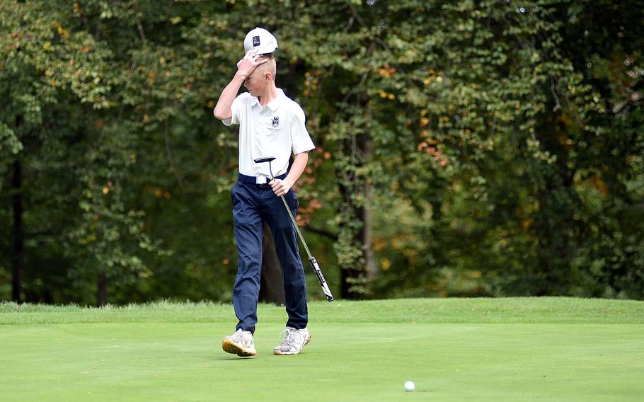 Tyler Korell reacts after a missed putt.