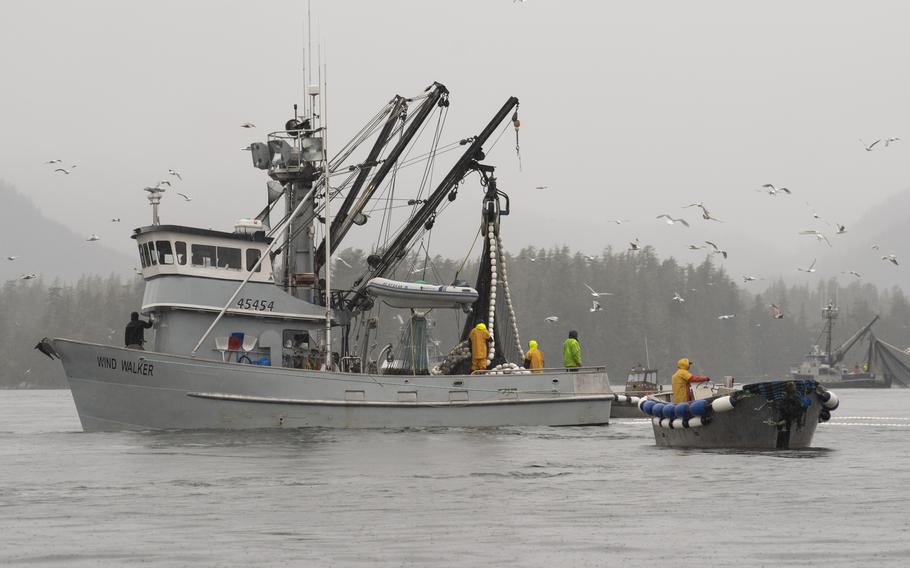 A fishing boat sailing off the coast of Alaska.