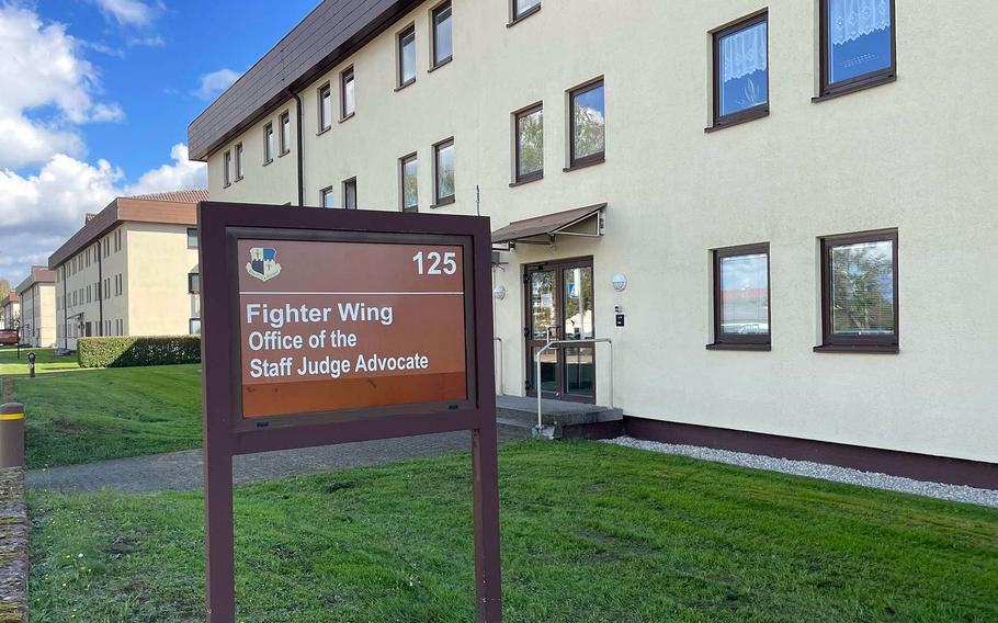 Sign for office of the staff judge advocate in front of building on Spangdahlem Air Base, Germany.