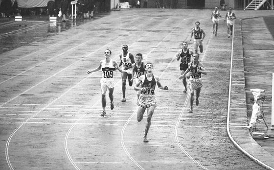 FILE - Bob Schul of West Milton, Ohio, hits the tape to win the 5,000 meter run at the Olympic Games in Tokyo Oct. 18, 1964. Schul, the only American distance runner to win the 5,000 meters at the Olympics, has died. He was 86. His death on Sunday, June 16, 2024, was announced by Miami University in Ohio, where Schul shined on the track and was inducted into the school’s hall of fame in 1973.  (AP Photo)