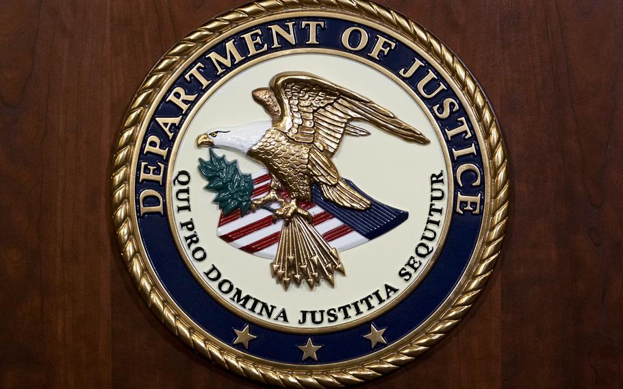 The seal of the Department of Justice