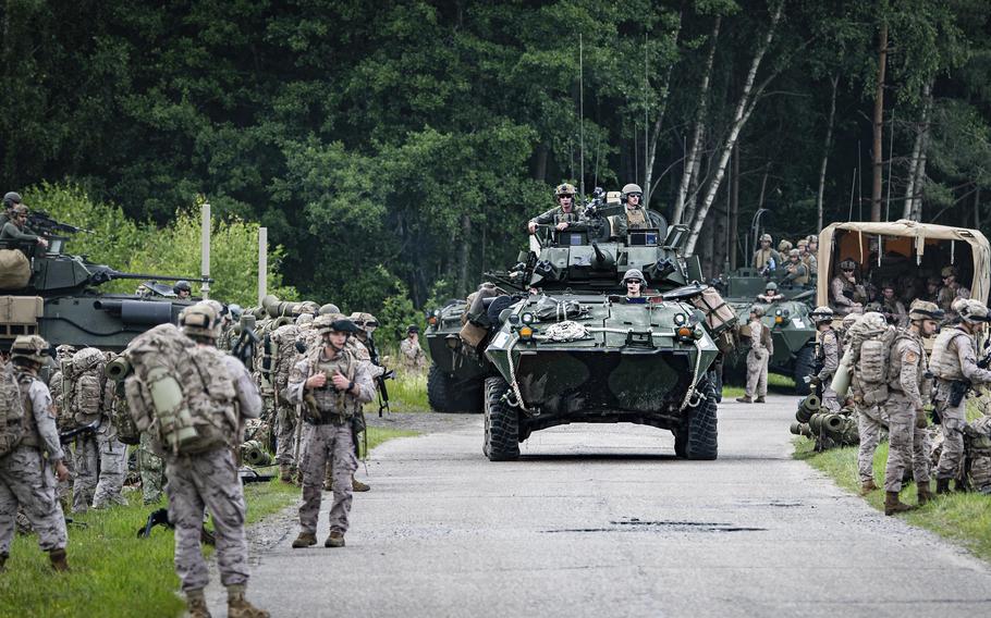 Military armored vehicles take part in the Baltops 2024 exercise in the Baltic Sea region, Sunday June 16, 2024. Some 9,000 troops from 20 NATO countries have been participating this month in military exercises in the Baltic Sea region, which has become strategically sensitive following Russia’s invasion of Ukraine. 