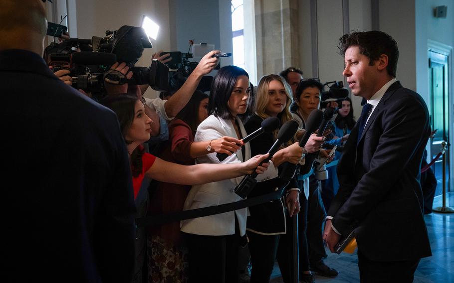 OpenAI CEO Sam Altman speaking with reporters on Capitol Hill last year.