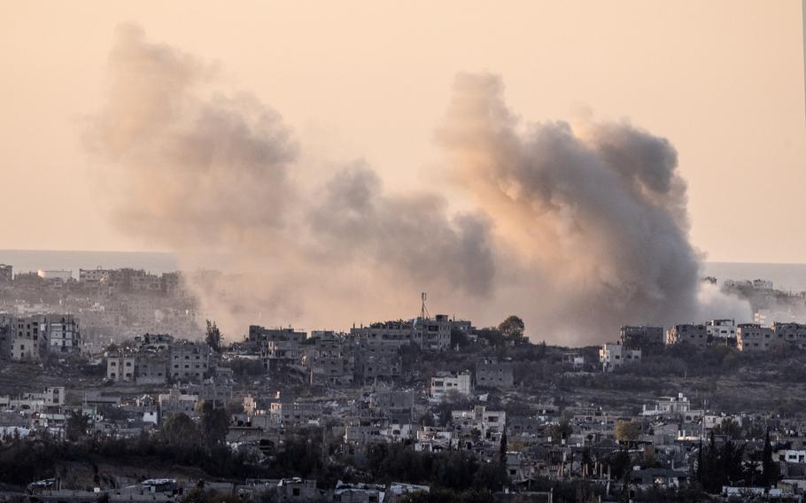 Plumes of smoke rose above the town.